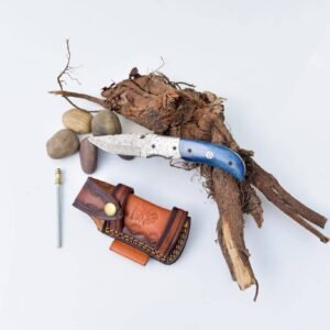 A knife with a patterned blade and blue handle, a leather sheath, and a sharpening steel