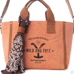 A rust-colored canvas Yellowstone tote bag with a brown paisley bandana and "Yellowstone Wild and Free Dutton Ranch Montana" text