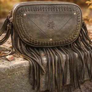 Zidana Stormy Trails Fringed Veg Tanned Leather Bag in Pine Dust by Myrabag